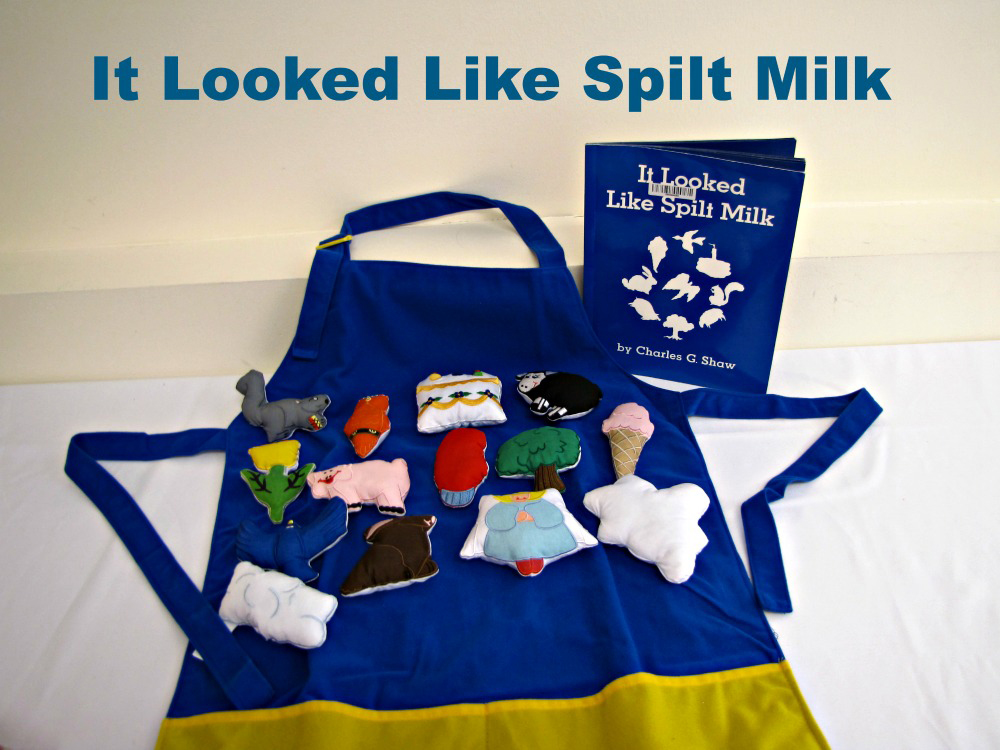 "It looked like Spilt Milk" book with and apron and different props from the book including different animals and food items
